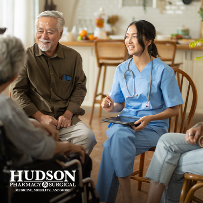 Group of seniors sitting with healthcare provider in senior living community