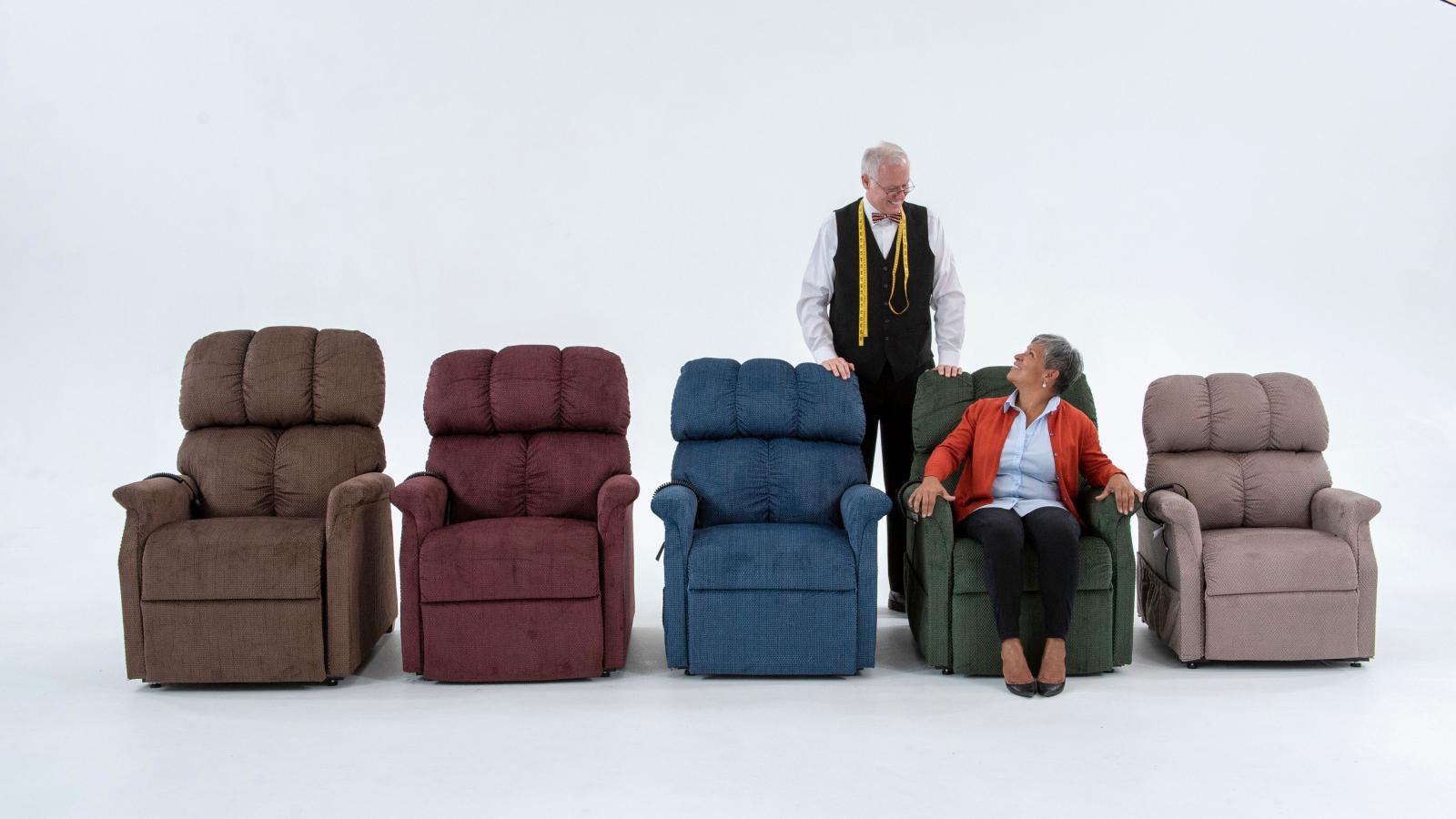 Image of woman testing out Comforter Lift Chair Series from Golden Technologies